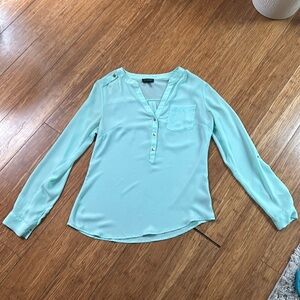 Light weight, light blue blouse. Size XS (but fits like S)